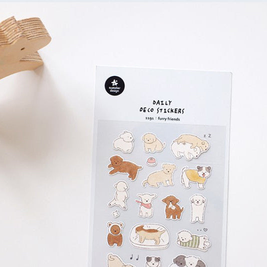 Sheet of dog-themed stickers with a wooden holder on a white background