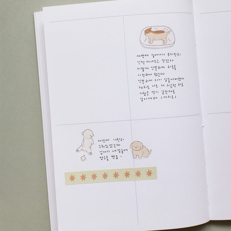 Open book with illustrations and text on a plain background