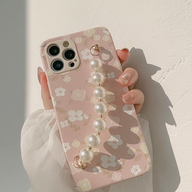 Pink blossoms iPhone case with pearl chain